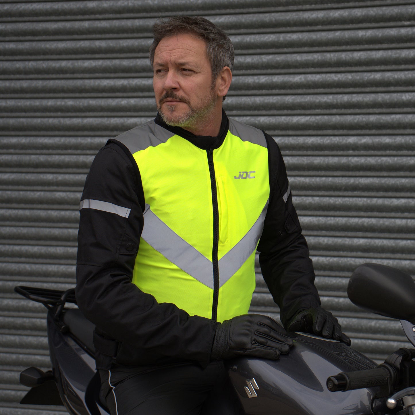 JDC Product's Axis hi vis jacket for bikers in action