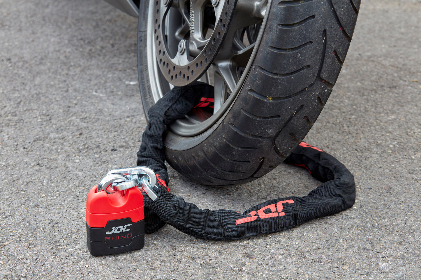 JDC Product's heavy duty disk lock for motorbike security in action